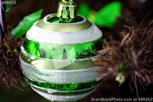 Image of Christmas ornaments on tree.