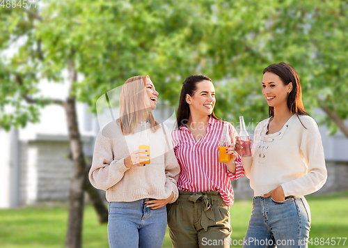 Image of young women with non alcoholic drinks talking