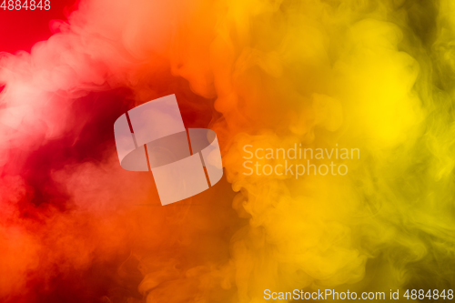 Image of Abstract colorful, multicolored smoke spreading, bright background for advertising or design, wallpaper for gadget