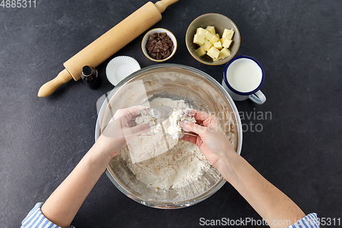 Image of chef or baker making dough at bakery