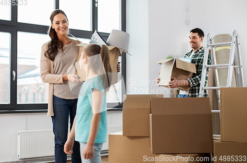 Image of happy family with child moving to new home