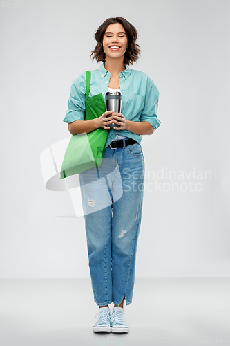 Image of woman with bag for food shopping and tumbler