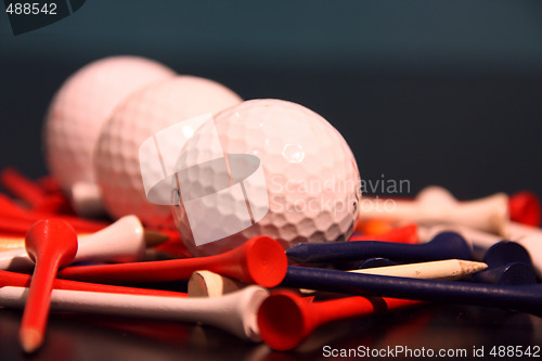 Image of Golf ball and tees lined up