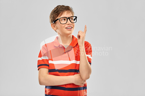 Image of portrait of happy smiling boy in eyeglasses