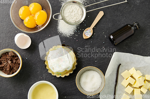 Image of baking dish with dough and cooking ingredients