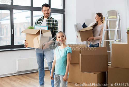 Image of happy family with child moving to new home