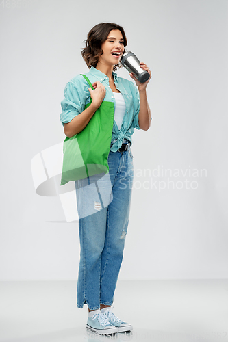 Image of woman with bag for food shopping and tumbler