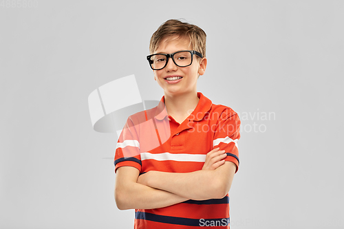 Image of portrait of happy smiling boy in eyeglasses