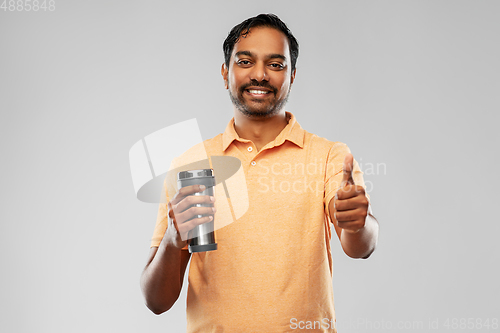 Image of indian man with thermo cup or tumbler for drink