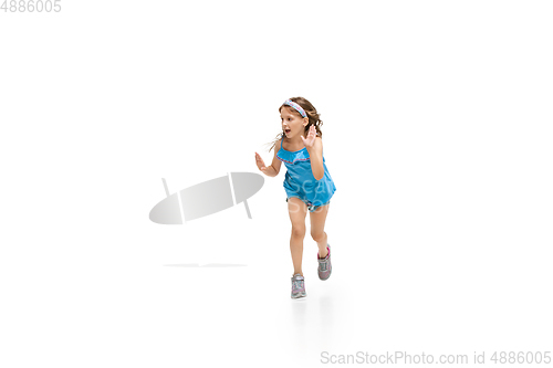 Image of Happy little caucasian girl jumping and running isolated on white background