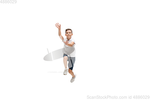 Image of Happy little caucasian boy jumping and running isolated on white background