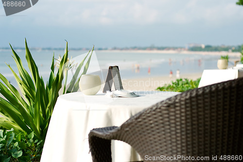 Image of table and chair on a beach