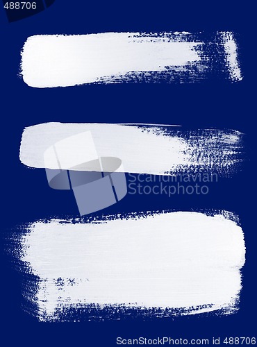 Image of White brush strokes on blue background