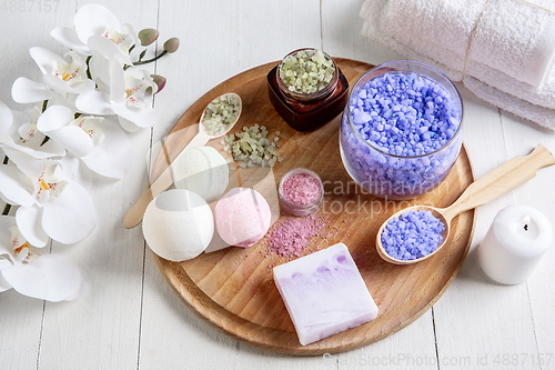 Image of Beautiful spa composition on massage table in wellness center, copyspace