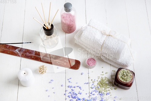 Image of Beautiful spa composition on massage table in wellness center, copyspace