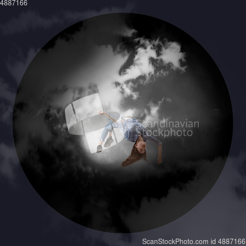 Image of Mid-air beauty. Full length studio shot of attractive young woman hovering in air and keeping eyes closed