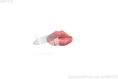 Image of Close up view of female mouth wearing nude lipstick isolated over white studio background