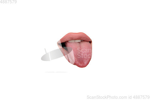 Image of Close up view of female mouth wearing nude lipstick isolated over white studio background