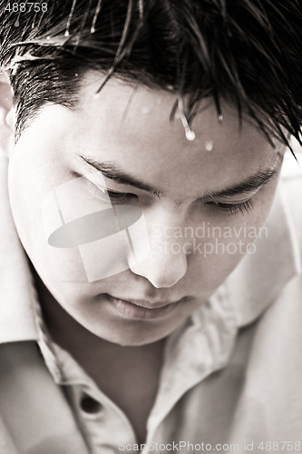 Image of Depressed young asian male