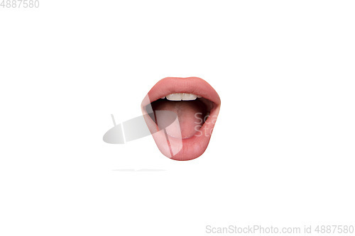 Image of Close up view of female mouth wearing nude lipstick isolated over white studio background