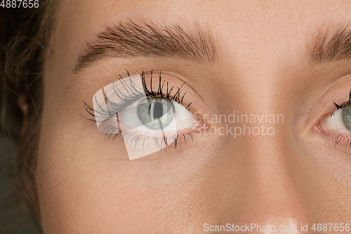 Image of Close up of face of beautiful caucasian young woman, focus on eyes