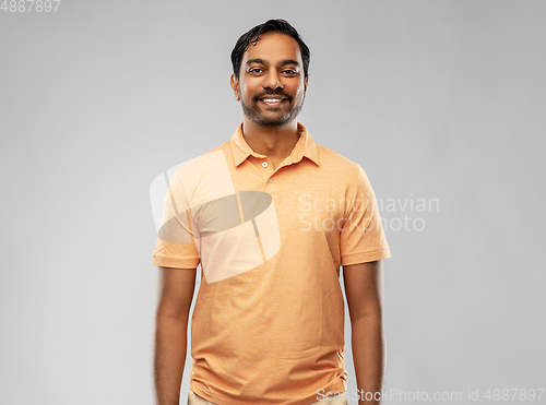 Image of portrait of happy smiling young indian man