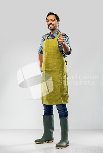 Image of indian male gardener or farmer showing thumbs up