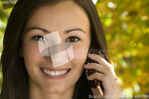 Image of Beautiful Girl Talking on the Phone