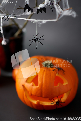 Image of pumpkins, candles and halloween decorations