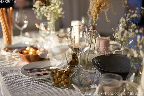 Image of dinner party table serving at home