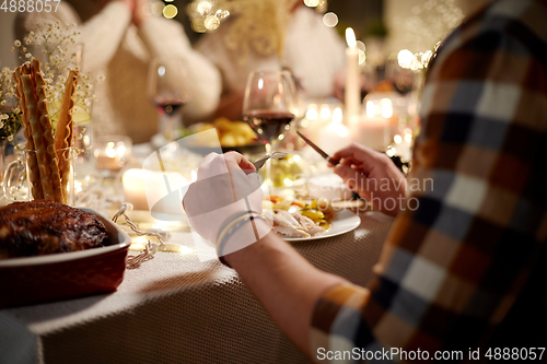 Image of man having christmas dinner at home