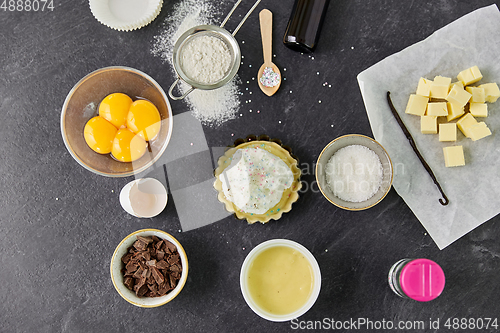 Image of baking dish with dough and cooking ingredients