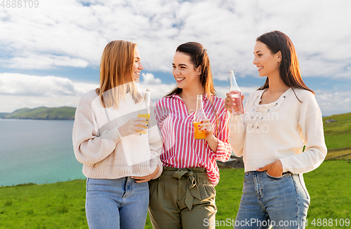 Image of women with non alcoholic drinks talking in ireland