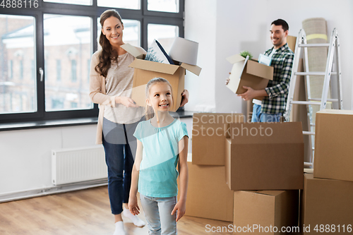 Image of happy family with child moving to new home