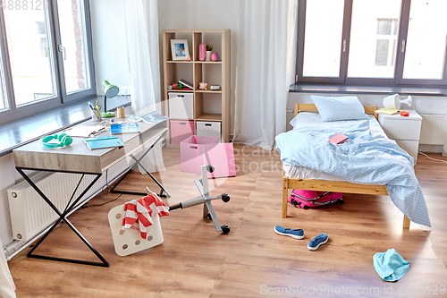 Image of messy home or kid's room with scattered stuff