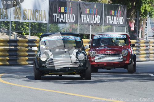 Image of Two Mini Coopers racing