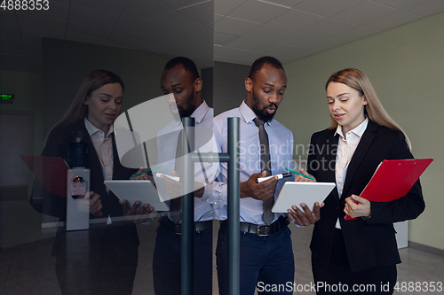 Image of Young businessman waiting for departure in airport, work trip, business lifestyle