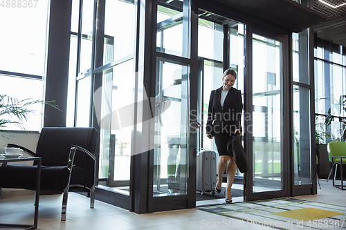 Image of Meeting of young business partners after arriving to end point of business trip