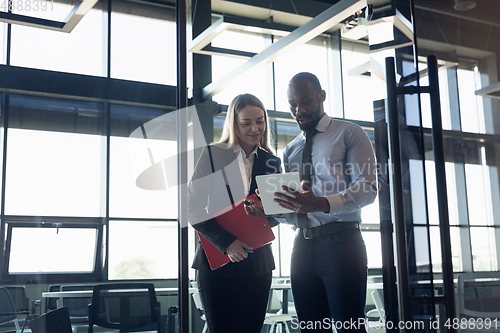 Image of Young businessman waiting for departure in airport, work trip, business lifestyle