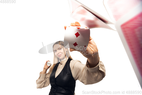 Image of Poker girl. Young woman, croupier isolated on white background. Highly tensioned, wide angle, fish eye view
