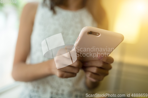 Image of Woman using smart phone