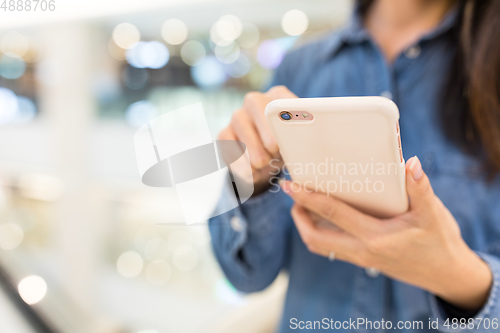 Image of Woman use of mobile phone