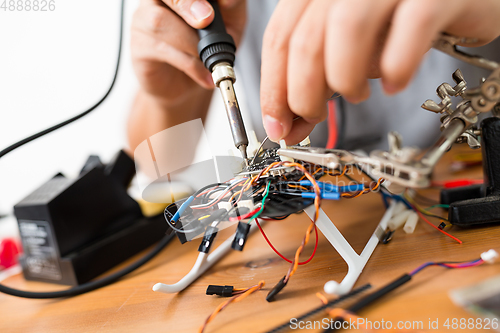 Image of Welding of electronic parts on drone