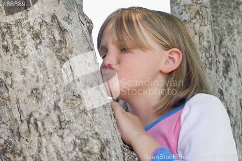 Image of girl in a tree