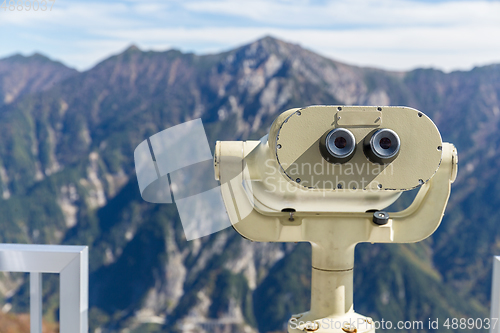 Image of Binocular in natural landscape