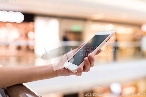 Image of Woman Hand holding cellphone