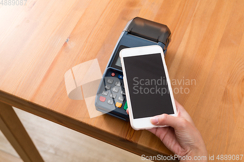 Image of Cellphone pay on NFC pos machine