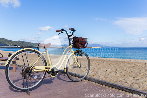 Image of Bike at seaside with sunshine