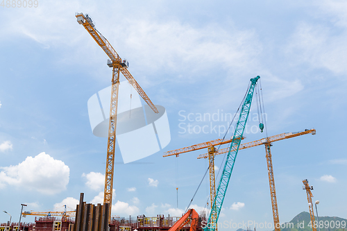 Image of Building Construction site with crane