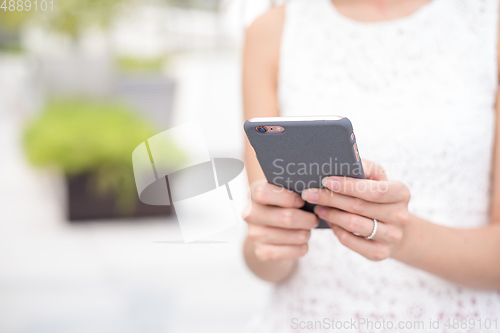 Image of Woman use of smart phone 